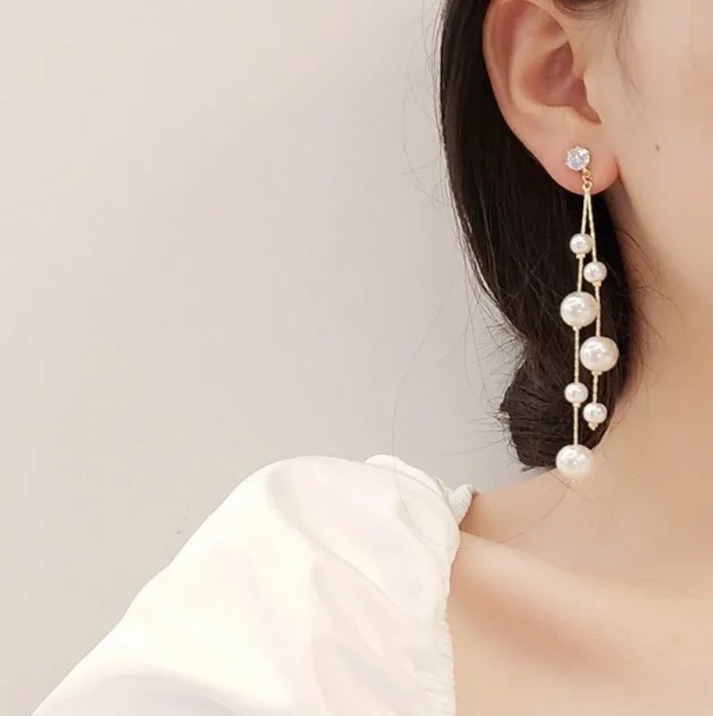 Large and small Pearl long earrings