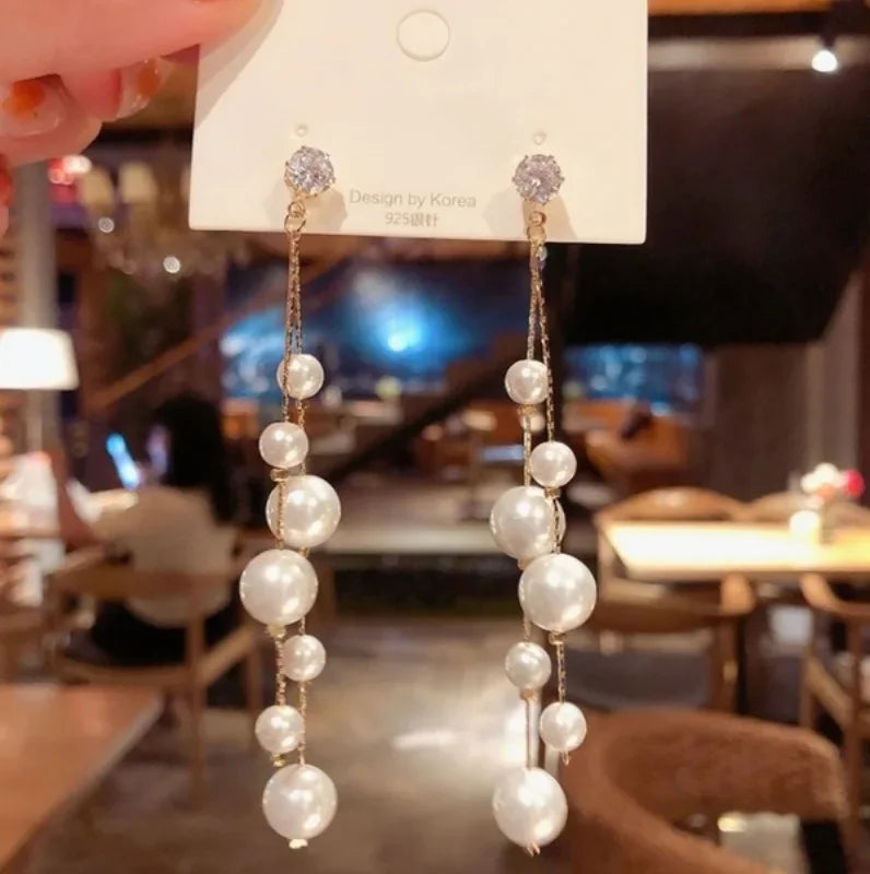 Large and small Pearl long earrings